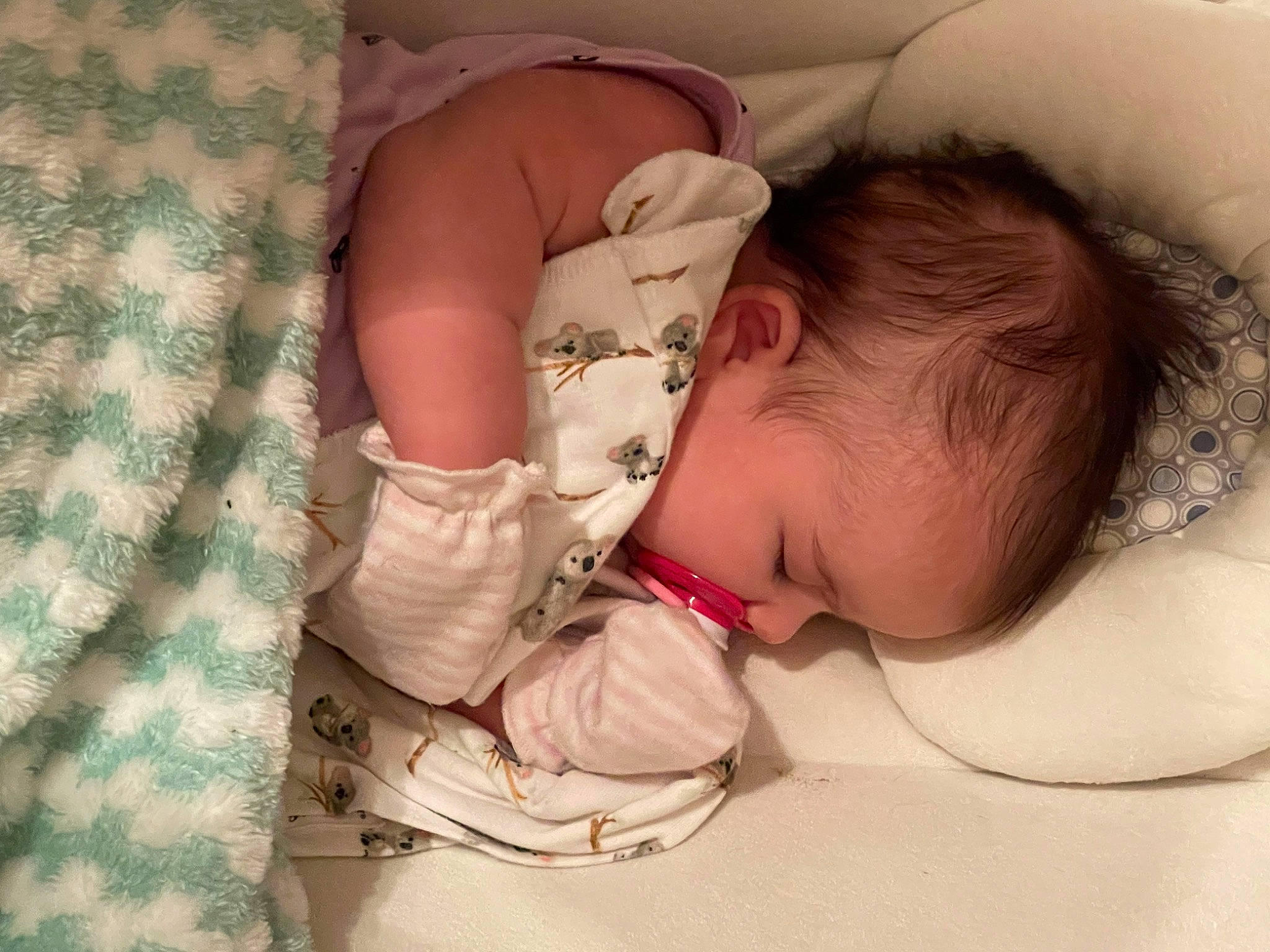 Mira is registered to the contest to win money with this photo: arm, baby, baby_sleeping, baby_toddler_clothing, bedtime, cheek, child, comfort, eyelash, finger, hand, head, linens, mouth, nose, pattern, person, skin, sleeve, textile