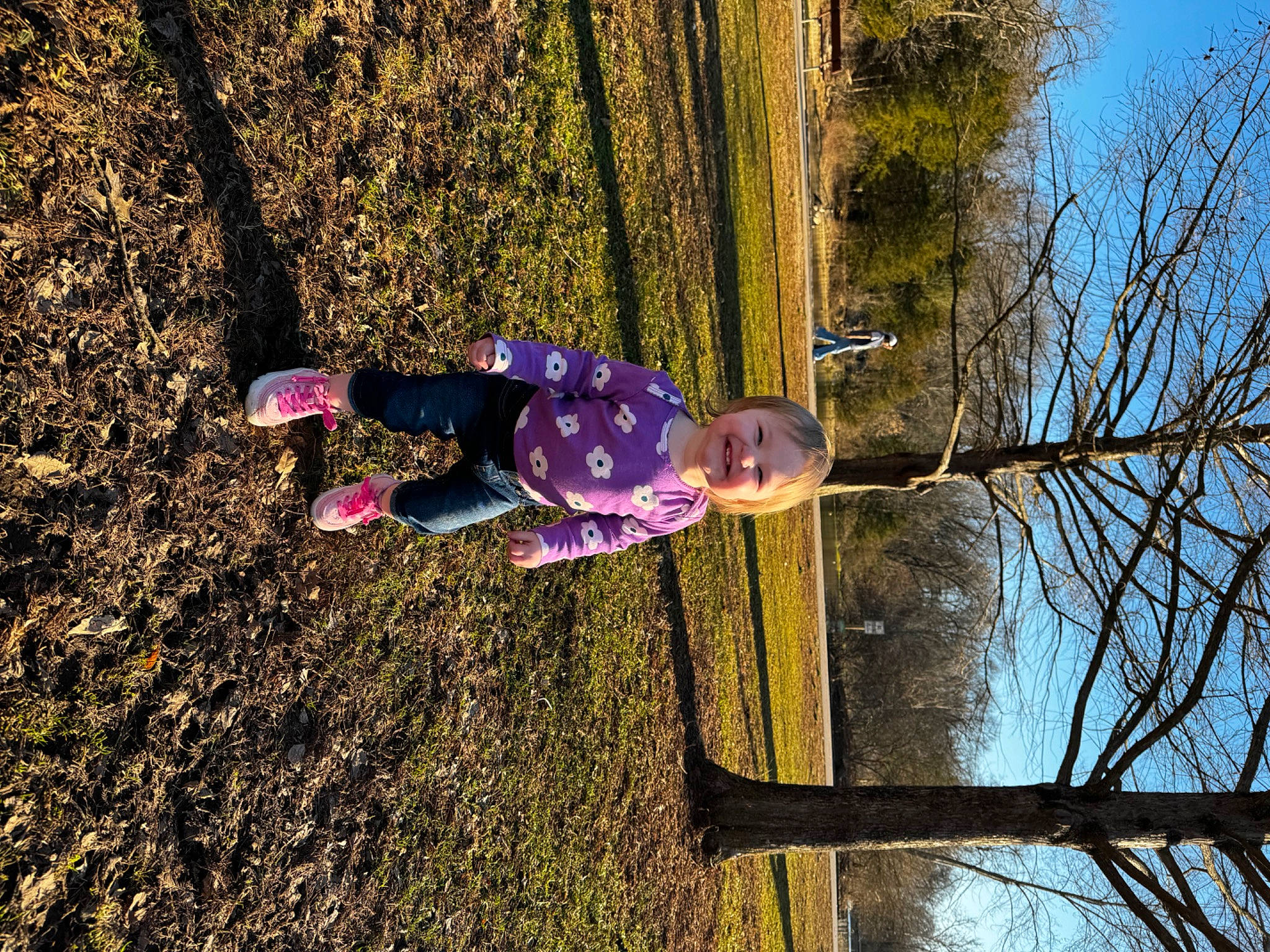 Ensley joined the competition — help win amazing prizes! branch, child, electric_blue, fun, grass, joy, landscape, leisure, magenta, people_in_nature, person, plant, recreation, sky, spring, tints_and_shades, toddler, tree, trunk, winter
