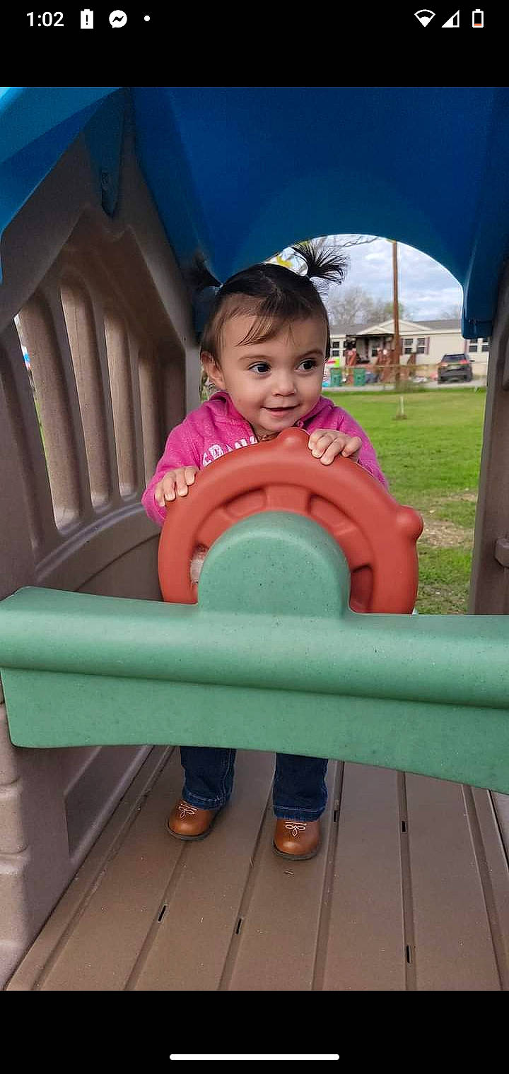 Chloe Marie is registered to the contest to win money with this photo: baby, baby_toddler_clothing, eye, facial_expression, fun, grass, happy, joy, leisure, person, pink, product, recreation, sitting, skin, sky, sleeve, smile, standing, t_shirt