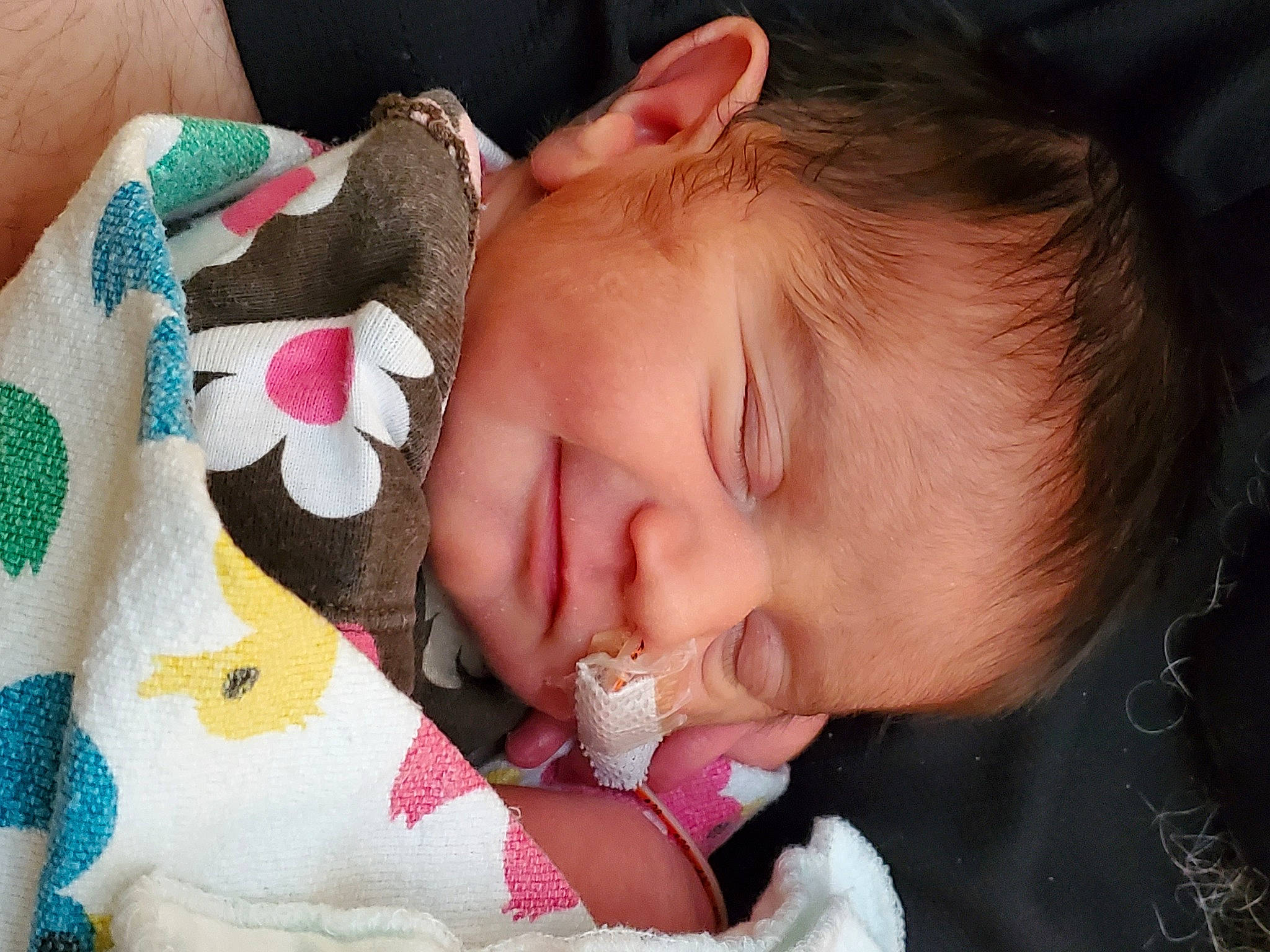 Kara is registered to the contest to win money with this photo: baby, baby_toddler_clothing, cheek, chin, comfort, ear, eye, eyebrow, eyelash, facial_expression, hand, headgear, iris, lip, mouth, neck, nose, person, pink, skin