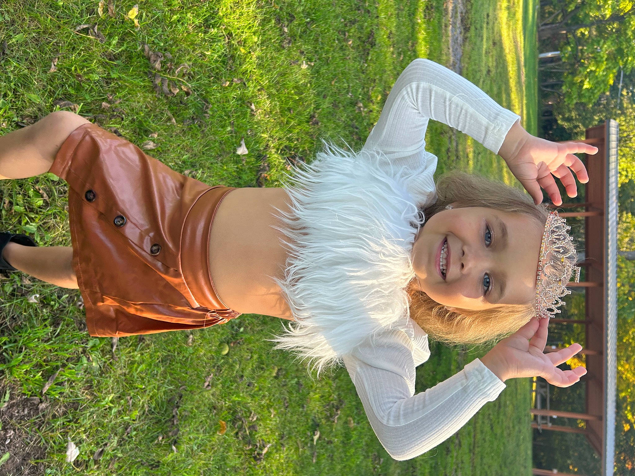 Alyvia joined the competition — help win amazing prizes! arm, child, costume, event, fun, glove, grass, happy, hat, headwear, human_leg, joy, lawn_ornament, leisure, people_in_nature, person, plant, smile, toddler, tree