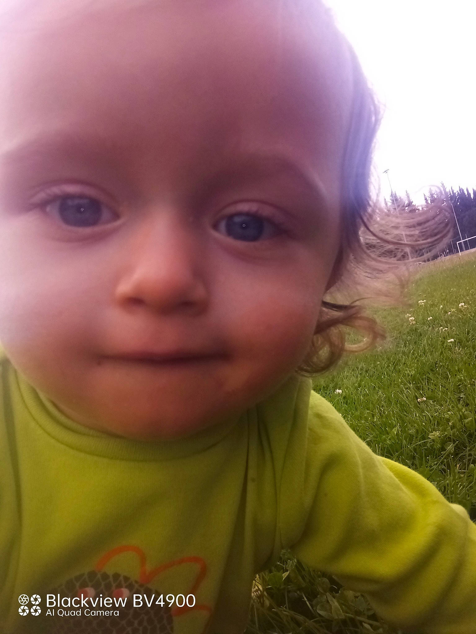 Inessa participe au concours pour gagner de l'argent avec cette photo : baby, baby_toddler_clothing, blond, cheek, close_up, eyebrow, eyelash, forehead, fun, grass, happy, iris, lip, mouth, neck, nose, person, plant, skin, smile