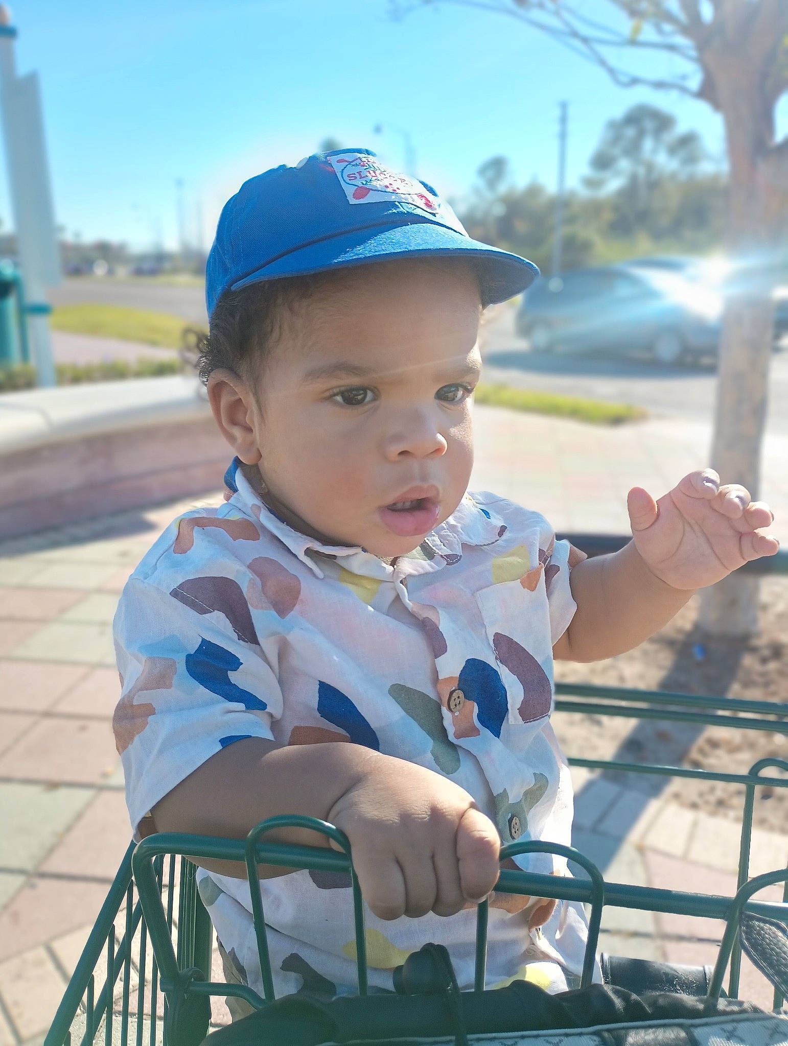 Royal joined the competition — help win amazing prizes! baby, baby_toddler_clothing, baseball_cap, cap, child, city, electric_blue, fun, grass, happy, hat, leisure, person, recreation, sitting, skin, sky, toddler, travel, tree