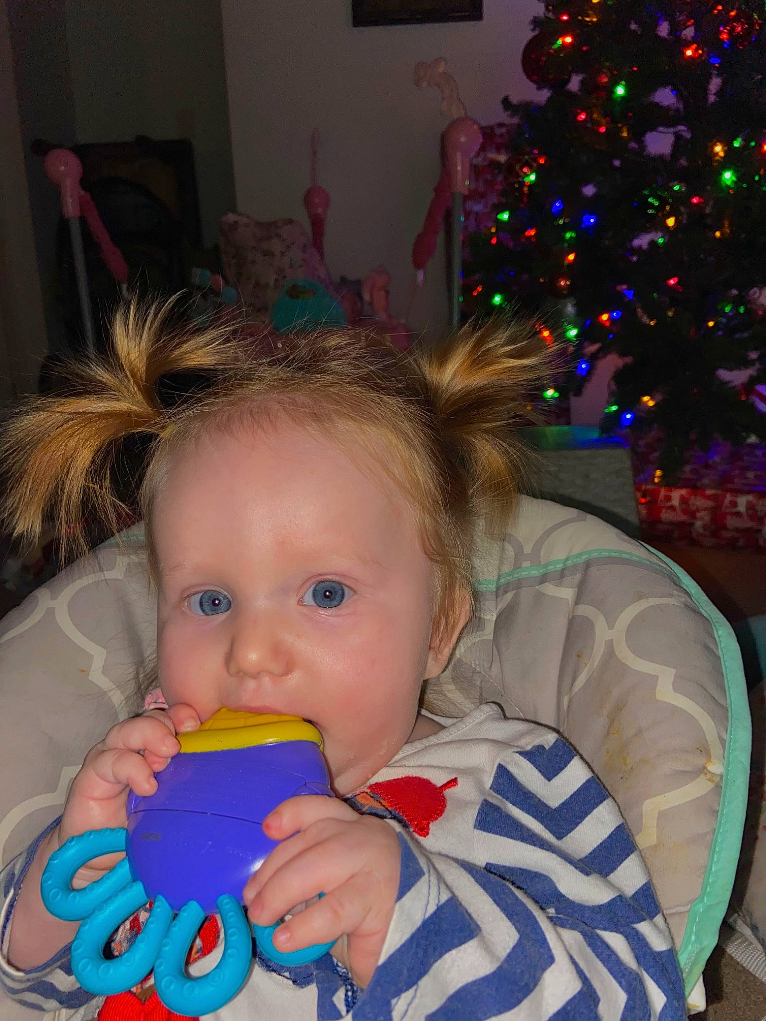 Kenleigh joined the competition — help win amazing prizes! baby, baby_toddler_clothing, cheek, child, christmas, christmas_decoration, christmas_ornament, christmas_tree, event, fun, happy, head, holiday, holiday_ornament, human_body, iris, person, room, toddler, tree
