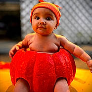 Ivengaline is registered to the contest to win money with this photo: baby, pumpkin, orange, cute, hat, drool, child, fall, autumn, costume, outdoor, portrait, seasonal, cute_expression, sitting, skin, headwear, holiday, festive, background_blur