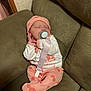 baby, child, clip, clothing, comfort, couch, cute, green, hat, home, infant, newborn, pacifier, pajamas, peaceful, person, pink, resting, sleeping, soft