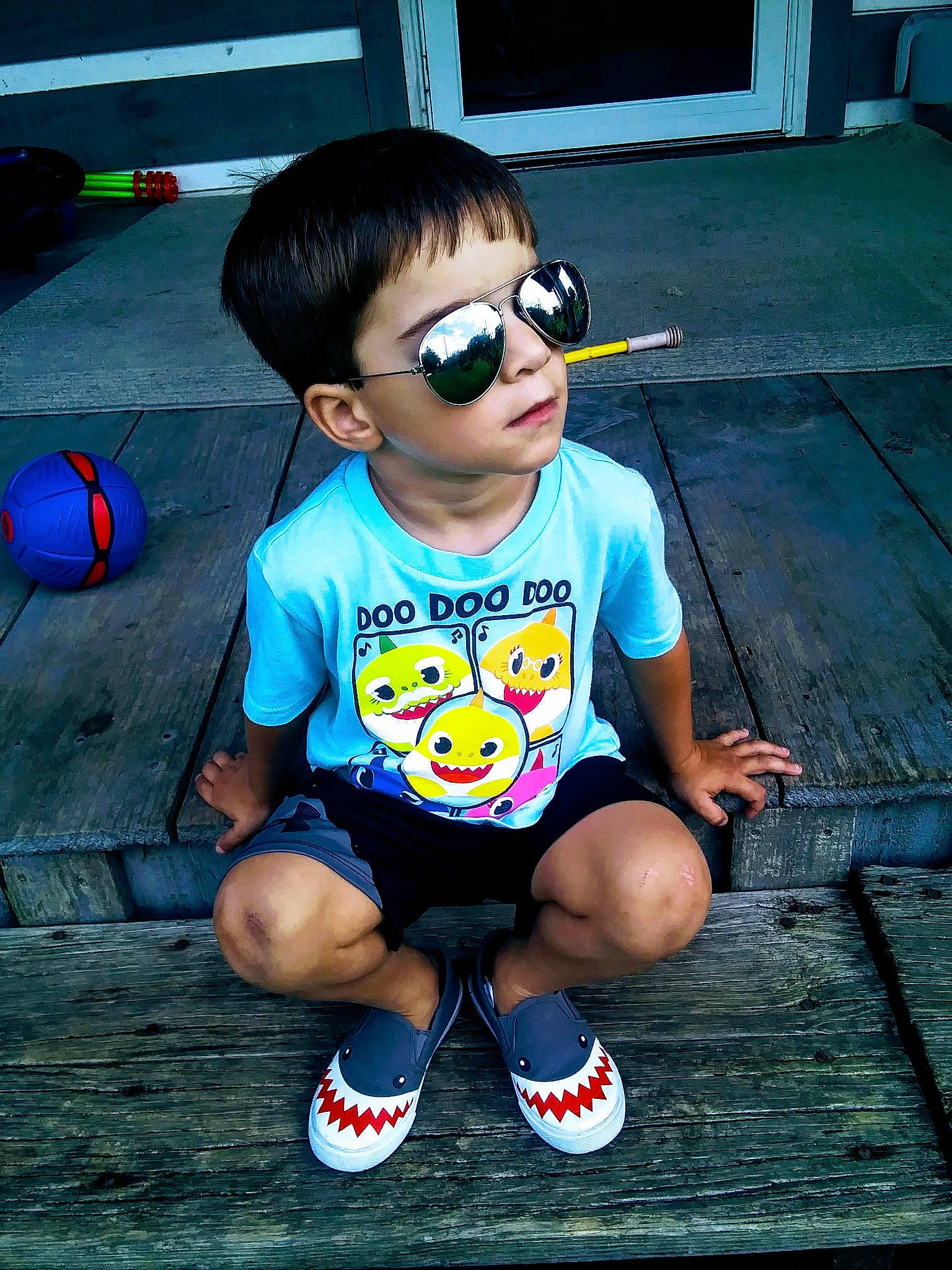 Blade joined the competition — help win amazing prizes! black_hair, child, cool, eyewear, footwear, fun, glasses, person, shoe, shorts, smile, sunglasses, t_shirt, toddler, top, vision_care