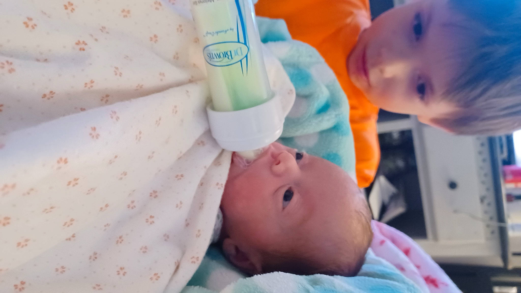 Myla is registered to the contest to win money with this photo: baby, baby_products, baby_safety, baby_toddler_clothing, cheek, child, comfort, drinkware, eyelash, happy, iris, linens, nose, pattern, person, product, room, skin, toddler