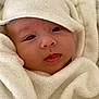 baby, infant, face, hood, blanket, towel, wrapped, cute, skin, eyes, tongue, closeup, soft, texture, warm, bed, resting, newborn, cozy, indoors