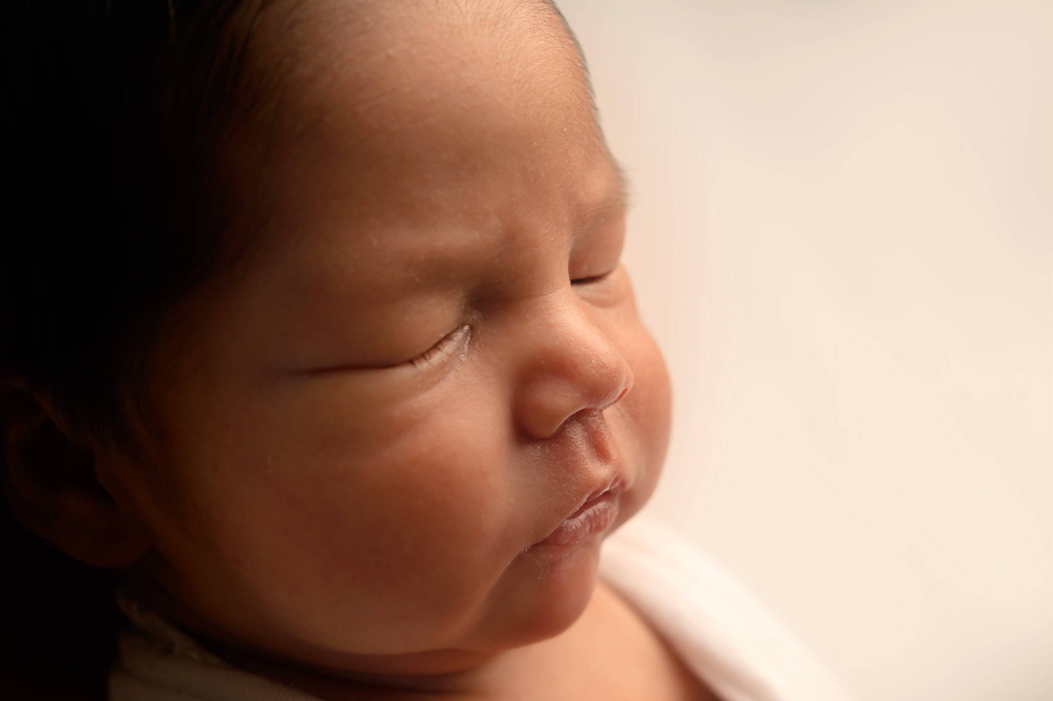 Logan is registered to the contest to win money with this photo: baby, cheek, child, close_up, comfort, ear, eyelash, fun, gesture, happy, laugh, lip, neck, nose, person, portrait_photography, thumb, toddler