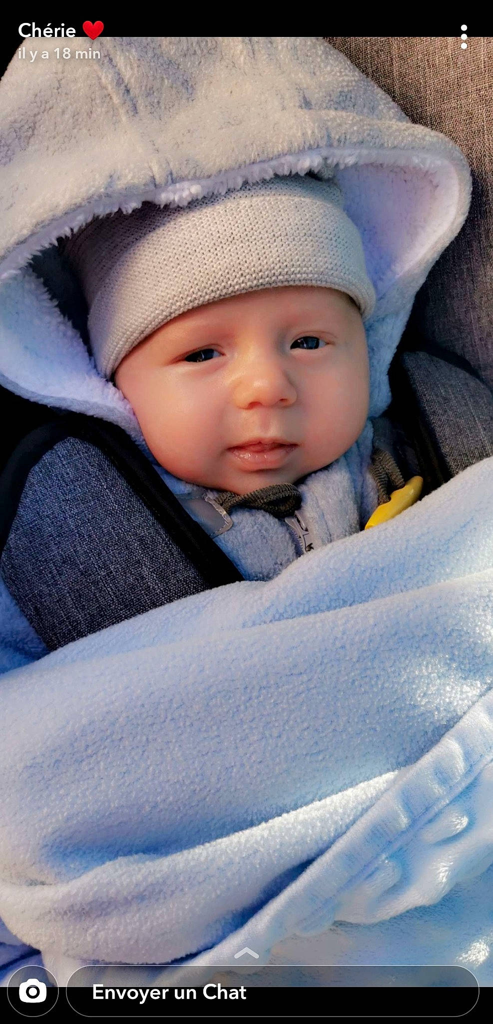 Ethan a rejoint le concours — aidez-le/la à gagner de superbes lots ! baby, baby_products, baby_sleeping, baby_toddler_clothing, cap, cheek, child, cloud, comfort, electric_blue, face, flash_photography, fur, happy, headwear, knit_cap, linens, outerwear, person, skin