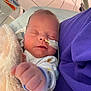 Zemira is registered to the contest to win money with this photo: baby, blanket, care, child, cozy, cute, face, feeding_tube, hand, hospital, infant, medical, newborn, onesie, person, purple_clothing, rest, sleeping, soft, tape
