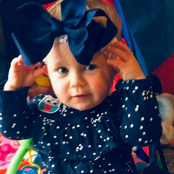 Kambrie is registered to the contest to win money with this photo: blue, child, cool, day, fashion_accessory, fun, girl, hair_accessory, happiness, headgear, infant, person, play, product, smile, toddler