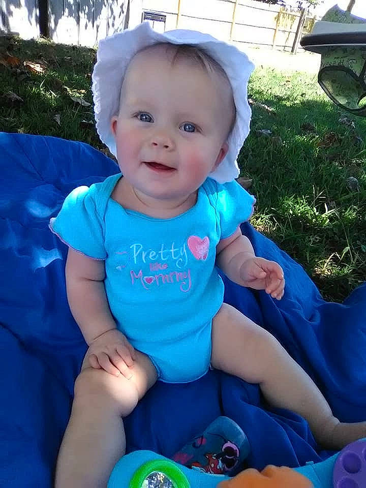 Kambrie joined the competition — help win amazing prizes! baby_products, blue, boy, child, cool, day, face, facial_expression, fun, head, headgear, infant, iris, person, play, product, sitting, smile, summer, toddler