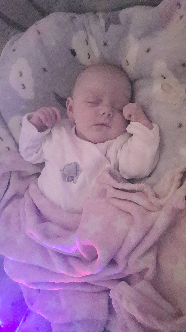 Amelia-rose joined the competition — help win amazing prizes! arm, baby, baby_toddler_clothing, cheek, chin, comfort, eye, eyebrow, face, head, human_body, iris, lip, mouth, nose, person, pink, purple, skin, sleeve