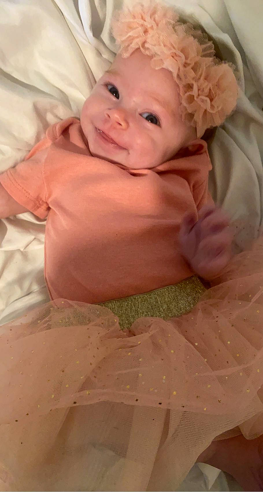 Gracelyn joined the competition — help win amazing prizes! abdomen, baby, baby_toddler_clothing, cheek, child, chin, comfort, eye, eyebrow, finger, happy, headwear, human_body, iris, lip, person, pink, skin, smile, stomach