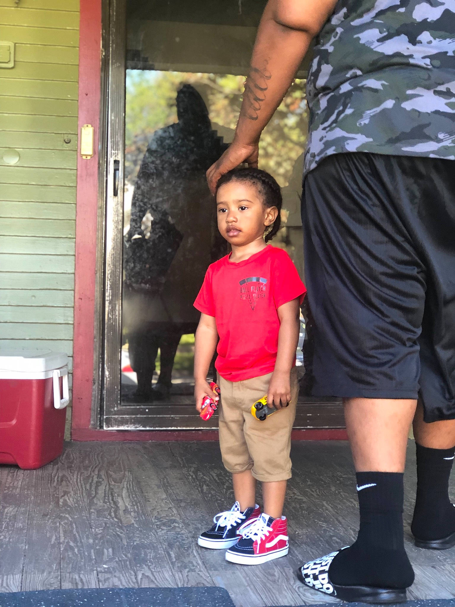 Dash is registered to the contest to win money with this photo: child, footwear, joint, knee, leg, person, shoe, shorts, shoulder, standing, style, t_shirt, toddler
