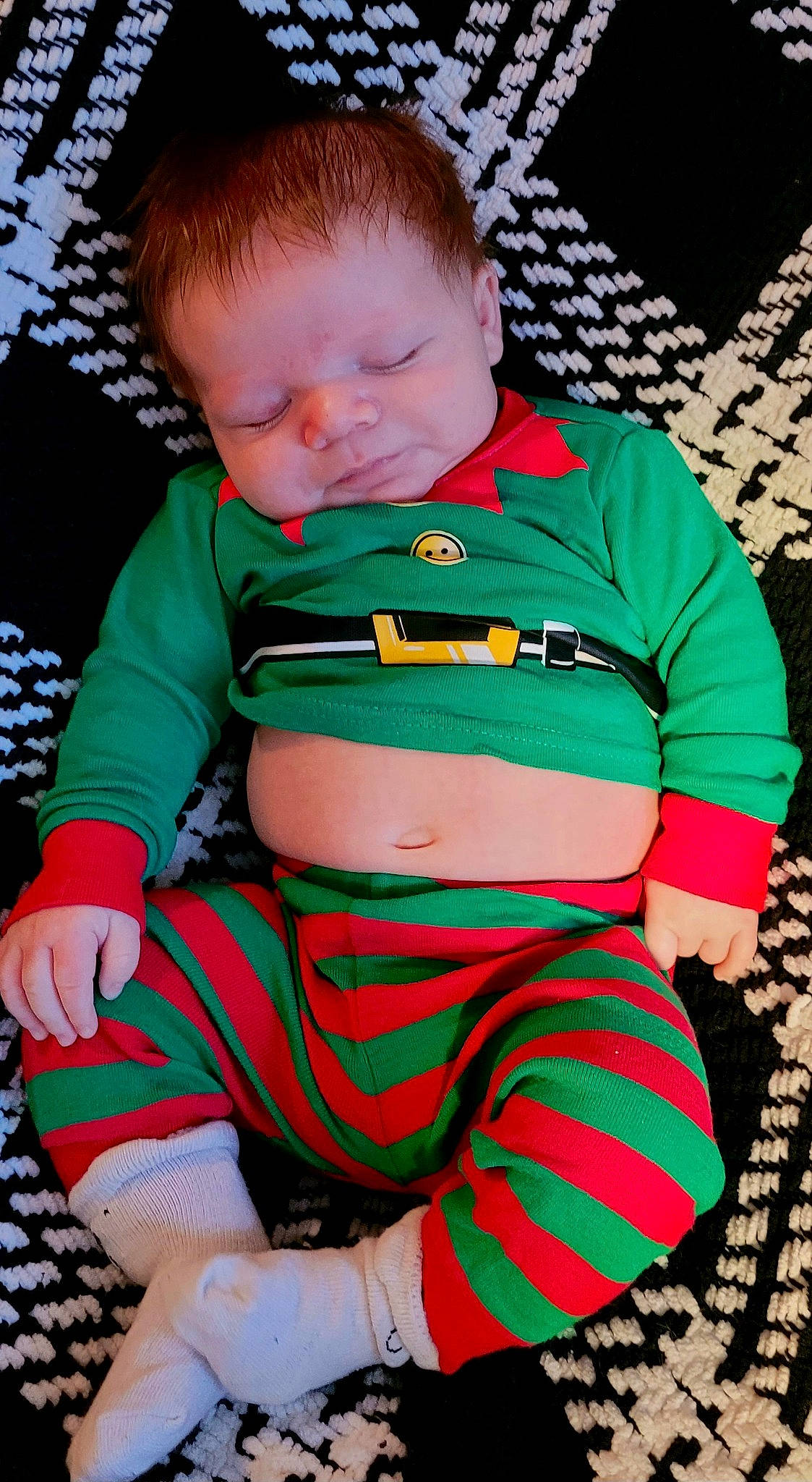 Kevin joined the competition — help win amazing prizes! baby, baby_products, baby_toddler_clothing, child, comfort, grass, green, human_leg, lap, pattern, person, play, red, sitting, sleeve, t_shirt, textile, thigh, toddler, trunk