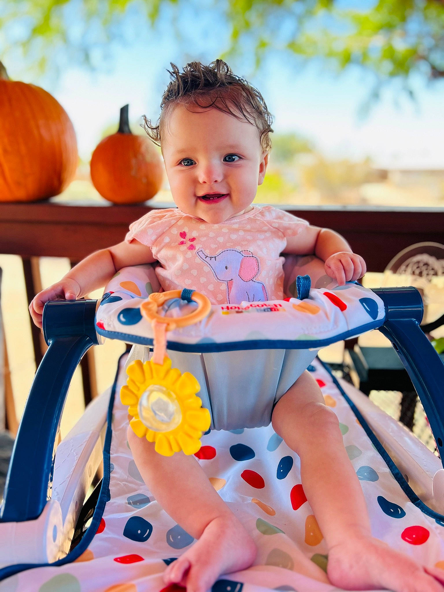 Lydia is registered to the contest to win money with this photo: baby, baby_toddler_clothing, calabaza, child, dress, facial_expression, fun, gourd, happy, leisure, natural_foods, orange, person, pumpkin, shorts, skin, smile, tire, toddler, wheel