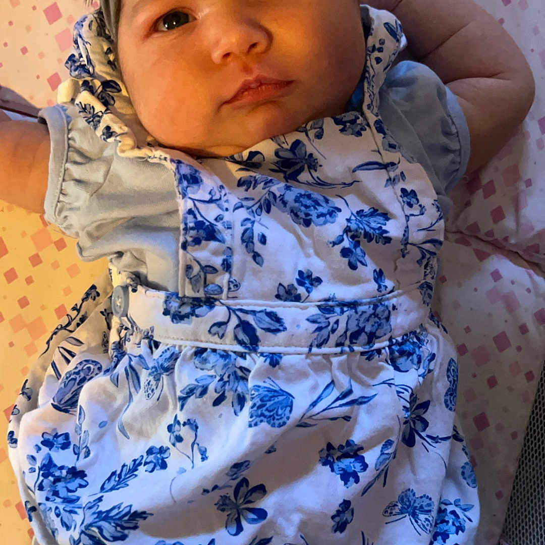Lillieona joined the competition — help win amazing prizes! accessories, baby, bed, bodypart, bonnet, cap, clothing, costume, dress, face, finger, furniture, hand, hat, head, headband, newborn, person, photography, portrait