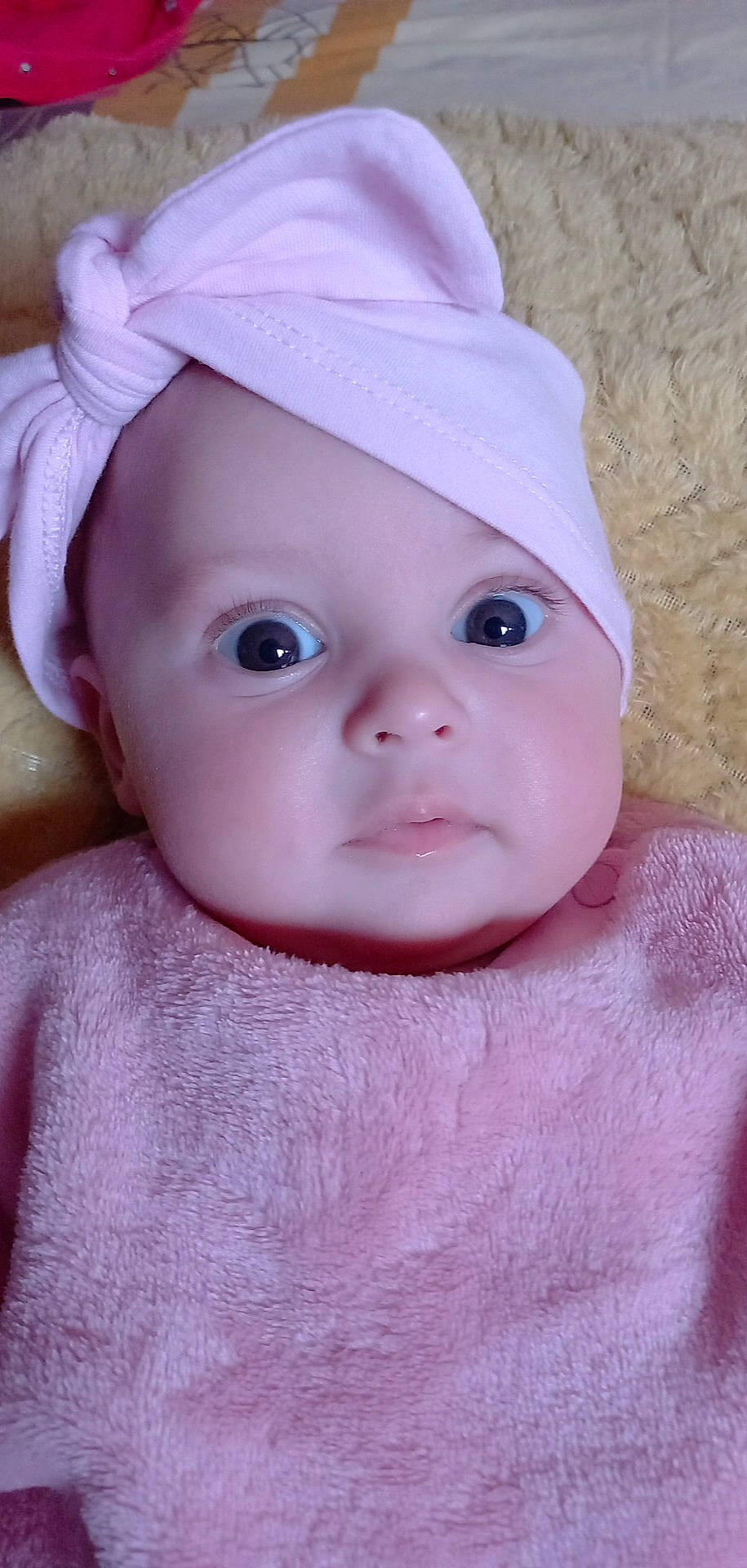 Judith participe au concours pour gagner de l'argent avec cette photo : baby, baby_toddler_clothing, beauty, cap, cheek, child, creative_arts, eye, eyebrow, eyelash, fashion_accessory, headgear, headwear, lip, magenta, pattern, person, pink, skin, sleeve