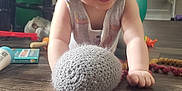 Paisley joined the competition — help win amazing prizes! baby, bodypart, crawling, face, finger, hand, hardwood, head, homedecor, indoors, person, photography, plush, portrait, shelf, sitting, sphere, towel, toy, wood