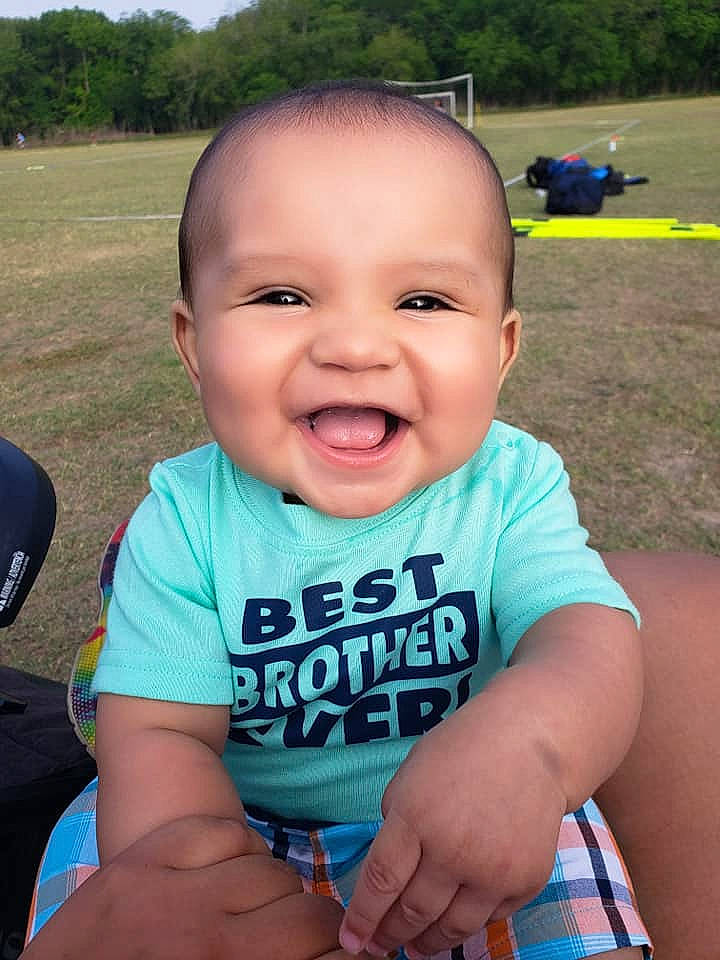 Mathew joined the competition — help win amazing prizes! baby, baby_toddler_clothing, cheek, chin, cool, facial_expression, finger, fun, grass, hairstyle, happy, joy, leisure, mouth, nose, person, product, skin, sky, sleeve