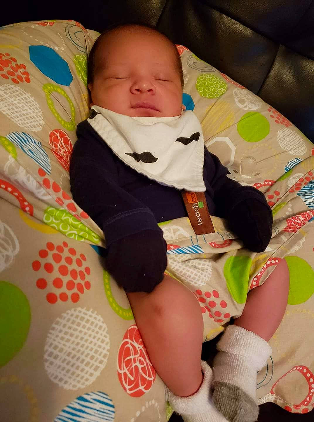 Mathew joined the competition — help win amazing prizes! arm, baby, baby_toddler_clothing, cheek, child, comfort, finger, human_body, human_leg, lap, leg, linens, pattern, person, product, sitting, skin, sleeve, textile, thigh