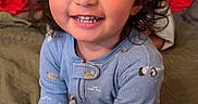 Mateo joined the competition — help win amazing prizes! bed, blue_clothing, child, cozy, cute, eyes, face, happy, home, indoors, kneeling, long_hair, pajamas, person, quilt, skin, smile, toddler, warm_lighting, young_child