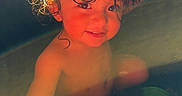 Mateo joined the competition — help win amazing prizes! basin, bath_time, bathtub, child, curious, curly_hair, cute, glowing, hand, happy, indoor, playful, portrait, skin, smile, sunlight, toddler, water, wet_hair, young_child