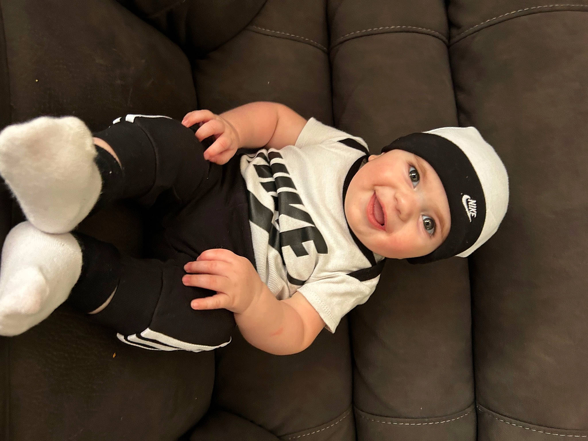 Frederick joined the competition — help win amazing prizes! baby, baby_toddler_clothing, child, comfort, elbow, fashion_accessory, finger, flash_photography, gesture, happy, hat, headgear, headwear, joy, mammal, person, sitting, sleeve, smile, thigh