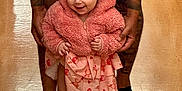 Alani joined the competition — help win amazing prizes! toddler, child, pink_jacket, dress, bow_headband, shoes, tattoos, adult_hands, floor, indoor, smile, happy, standing, supporting, person, clothing, footwear, cute, baby, portrait