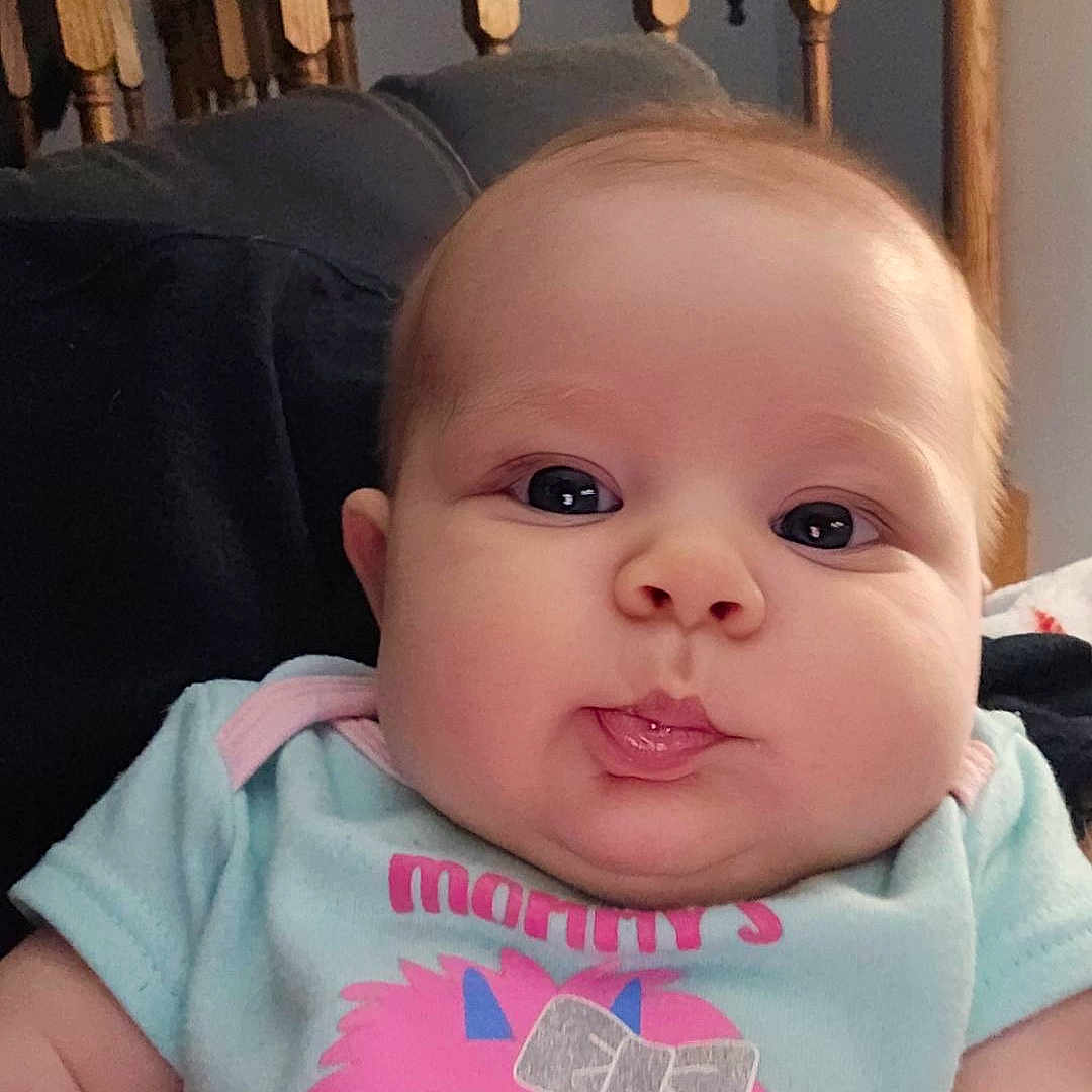 Serenity is registered to the contest to win money with this photo: baby, bed, bedroom, clothing, couch, crib, cushion, face, furniture, head, homedecor, indoors, infantbed, person, photography, portrait, quilt, room, selfie, t_shirt