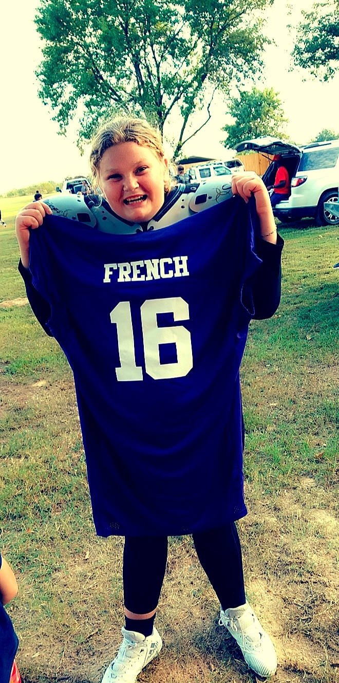 Aryan joined the competition — help win amazing prizes! cool, electric_blue, football_equipment, gesture, grass, happy, jersey, joy, person, personal_protective_equipment, player, sky, sleeve, smile, sports_gear, sports_jersey, sports_uniform, sportswear, t_shirt, tire