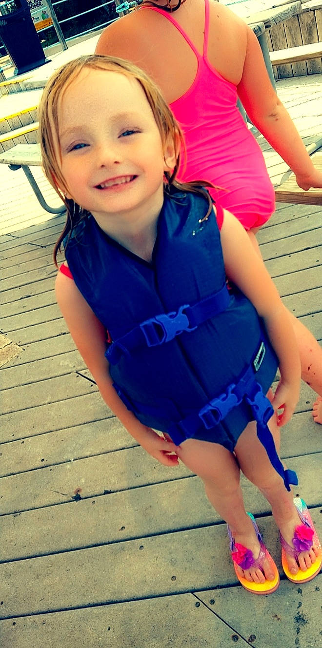 Hermaya is registered to the contest to win money with this photo: azure, beauty, child, electric_blue, fun, happy, joy, leg, leisure, person, photograph, plant, red, shoulder, skin, smile, snapshot, standing, summer, thigh