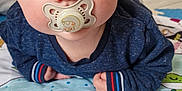Samaël participe au concours pour gagner de l'argent avec cette photo : baby, blue_sweater, child, close_up, cozy, curious, cute, floor, head_up, indoor, infant, lying_down, pacifier, person, play_mat, portrait, skin, striped_cuffs, wide_eyes, young_child