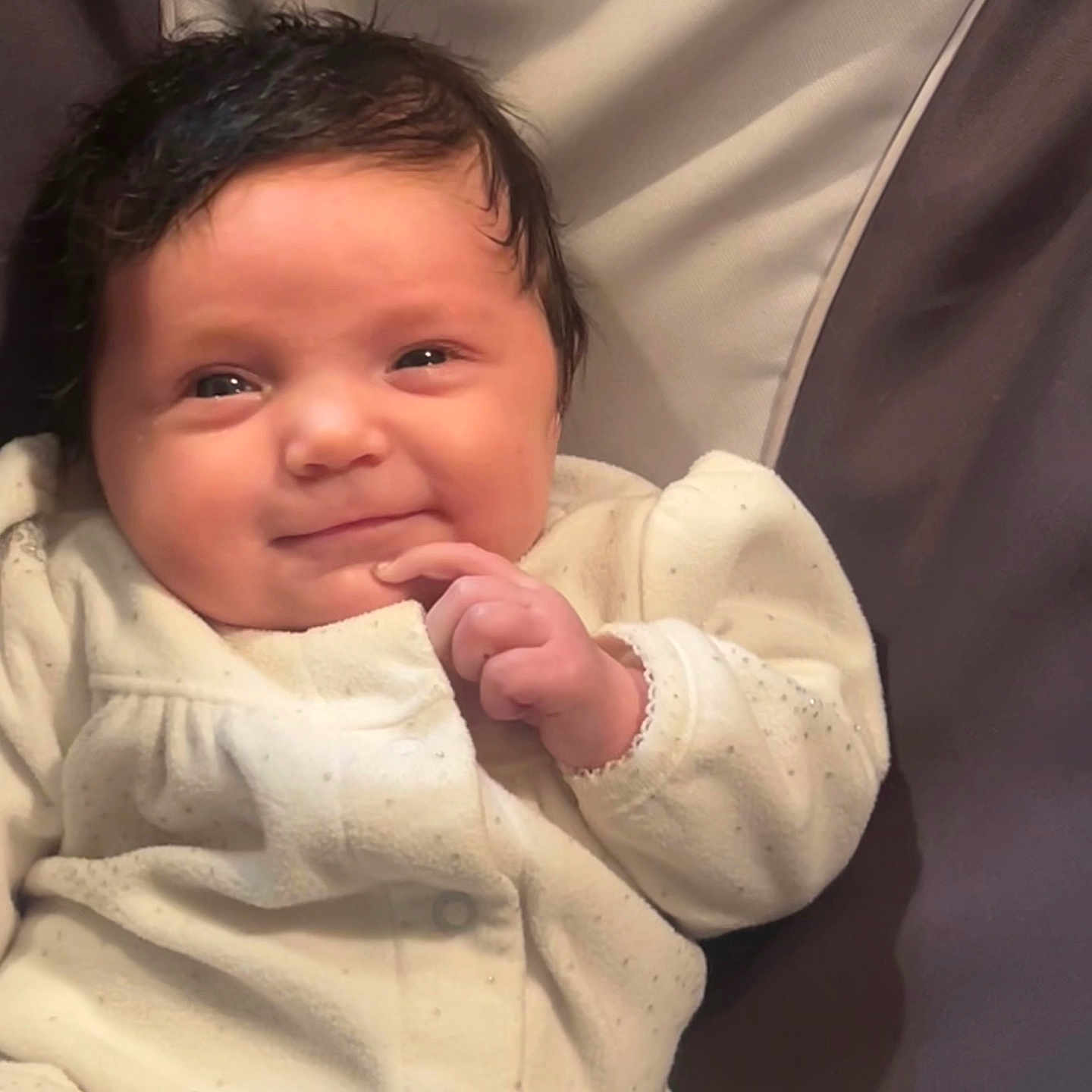 Ivy is registered to the contest to win money with this photo: baby, babylaughing, face, happy, head, newborn, person, photography, portrait, smile