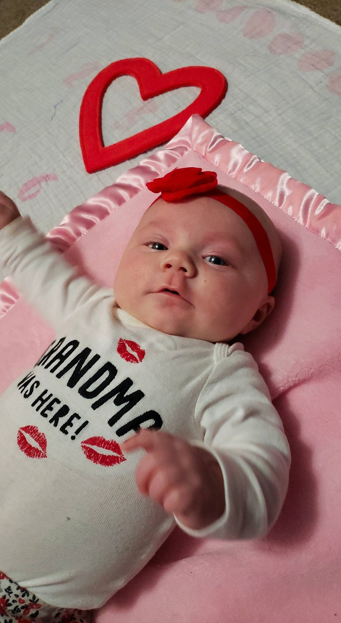 Brielle joined the competition — help win amazing prizes! baby, baby_products, baby_toddler_clothing, bib, bonnet, carmine, cheek, child, costume_accessory, costume_hat, headwear, hood, linens, lip, person, pink, sleeve, toddler