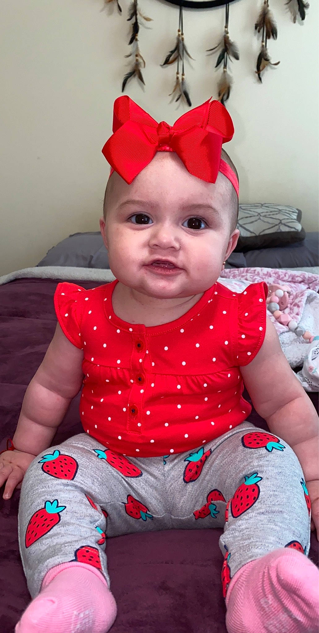 Yamilet joined the competition — help win amazing prizes! baby, baby_products, baby_toddler_clothing, cheek, child, design, face, head, headgear, headwear, lip, pajamas, pattern, person, pink, red, skin, sleeve, smile, toddler