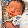 Andrew is registered to the contest to win money with this photo: baby, newborn, sleeping, blanket, soft, cute, infant, peaceful, wrapped, clothing, closeup, face, skin, hand, bedtime, resting, warm, small, adorable, quiet