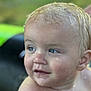 baby, blue_eyes, child, close_up, curious, cute, expression, face, head, infant, innocent, natural_light, outdoor, person, portrait, shoulder, skin, water_droplets, wet, young