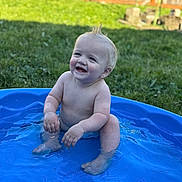 Ryker is registered to the contest to win money with this photo: baby, child, pool, water, smile, happy, outdoor, grass, fence, summer, splash, skin, barefoot, blue, play, sunlight, cute, infant, fun, nature