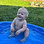 baby, child, pool, water, smile, happy, outdoor, grass, fence, summer, splash, skin, barefoot, blue, play, sunlight, cute, infant, fun, nature