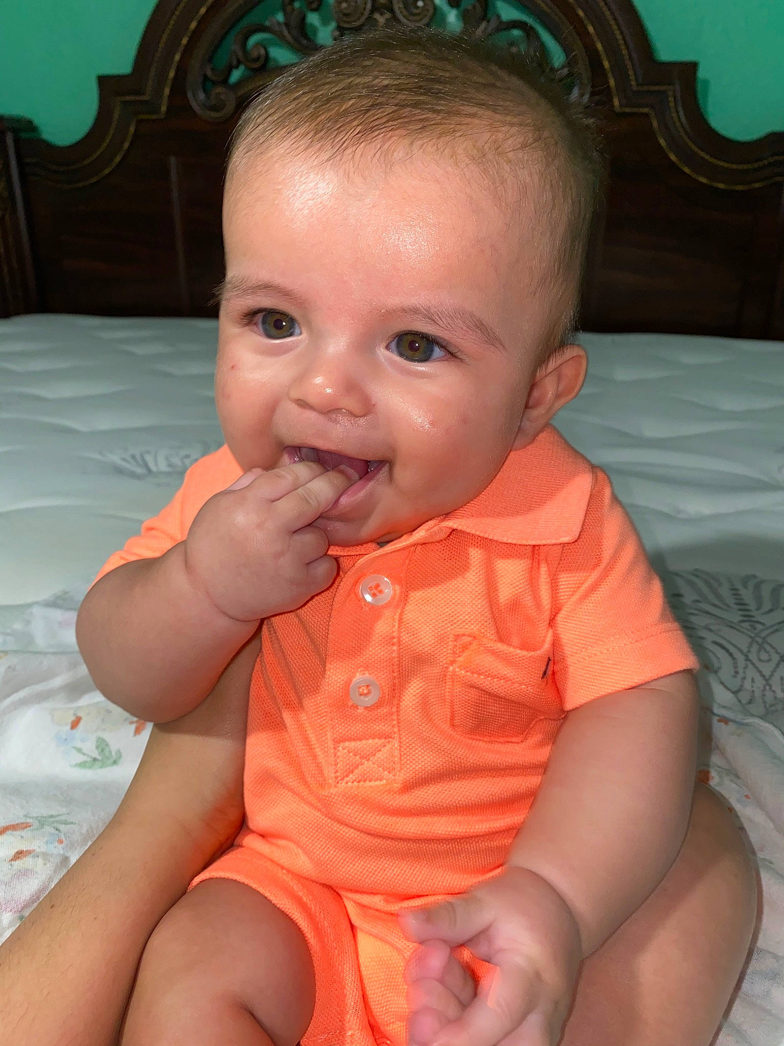 Francisco joined the competition — help win amazing prizes! baby, cheek, child, chin, eye, face, finger, forehead, head, iris, lip, mouth, neck, nose, orange, person, sitting, skin, smile, thumb