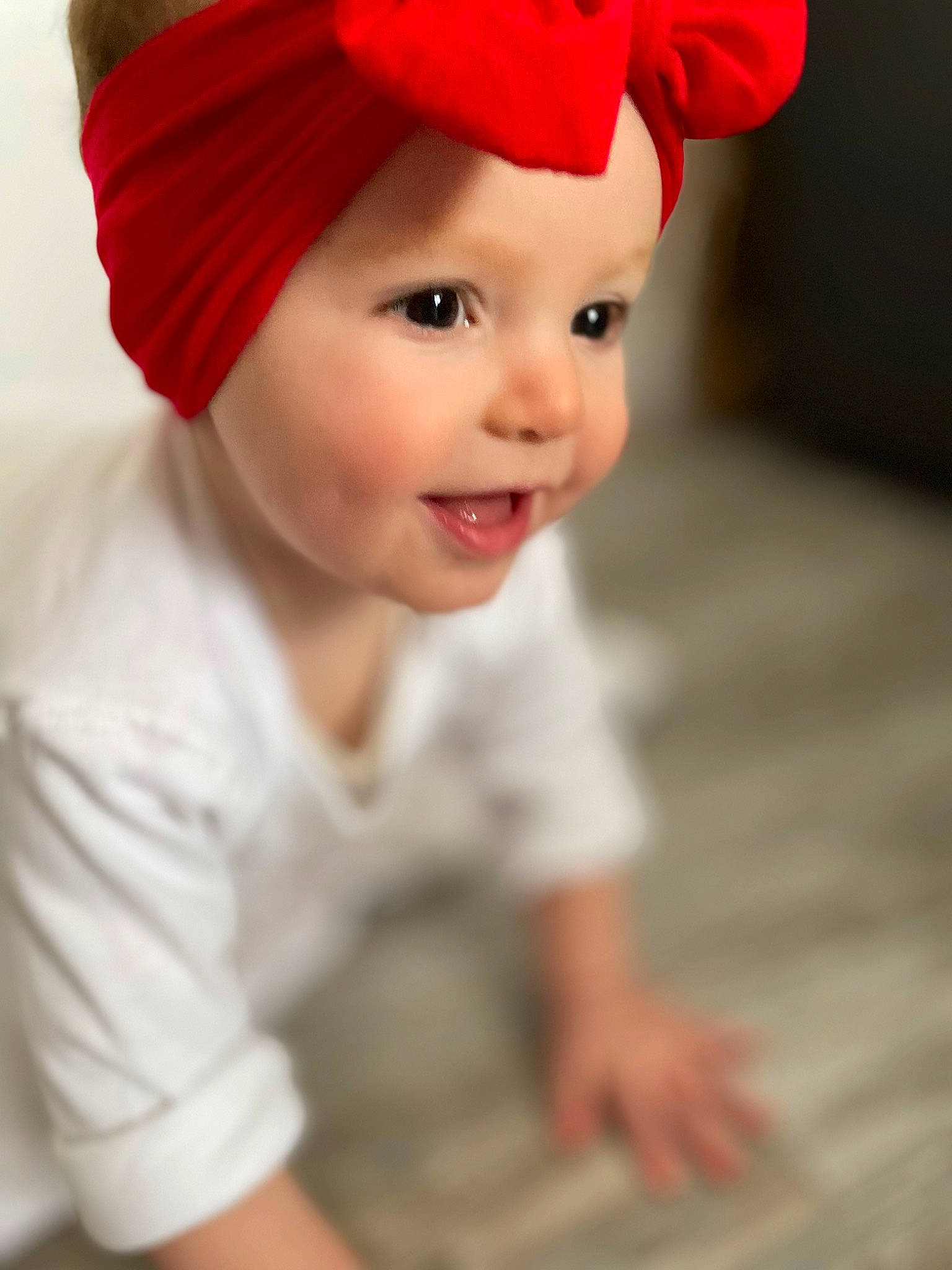 Darcey joined the competition — help win amazing prizes! baby, baby_toddler_clothing, cap, child, costume_hat, eye, face, fashion_accessory, flooring, fun, happy, hat, headgear, headwear, helmet, lip, magenta, person, sleeve, smile