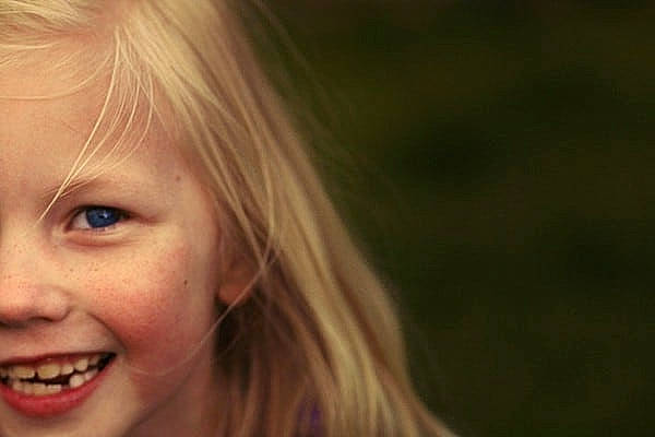 Trisha is registered to the contest to win money with this photo: blond, cheek, ear, eye, eyebrow, eyelash, face, flash_photography, fun, grass, hair, happy, iris, jaw, joy, layered_hair, lip, nose, person, smile