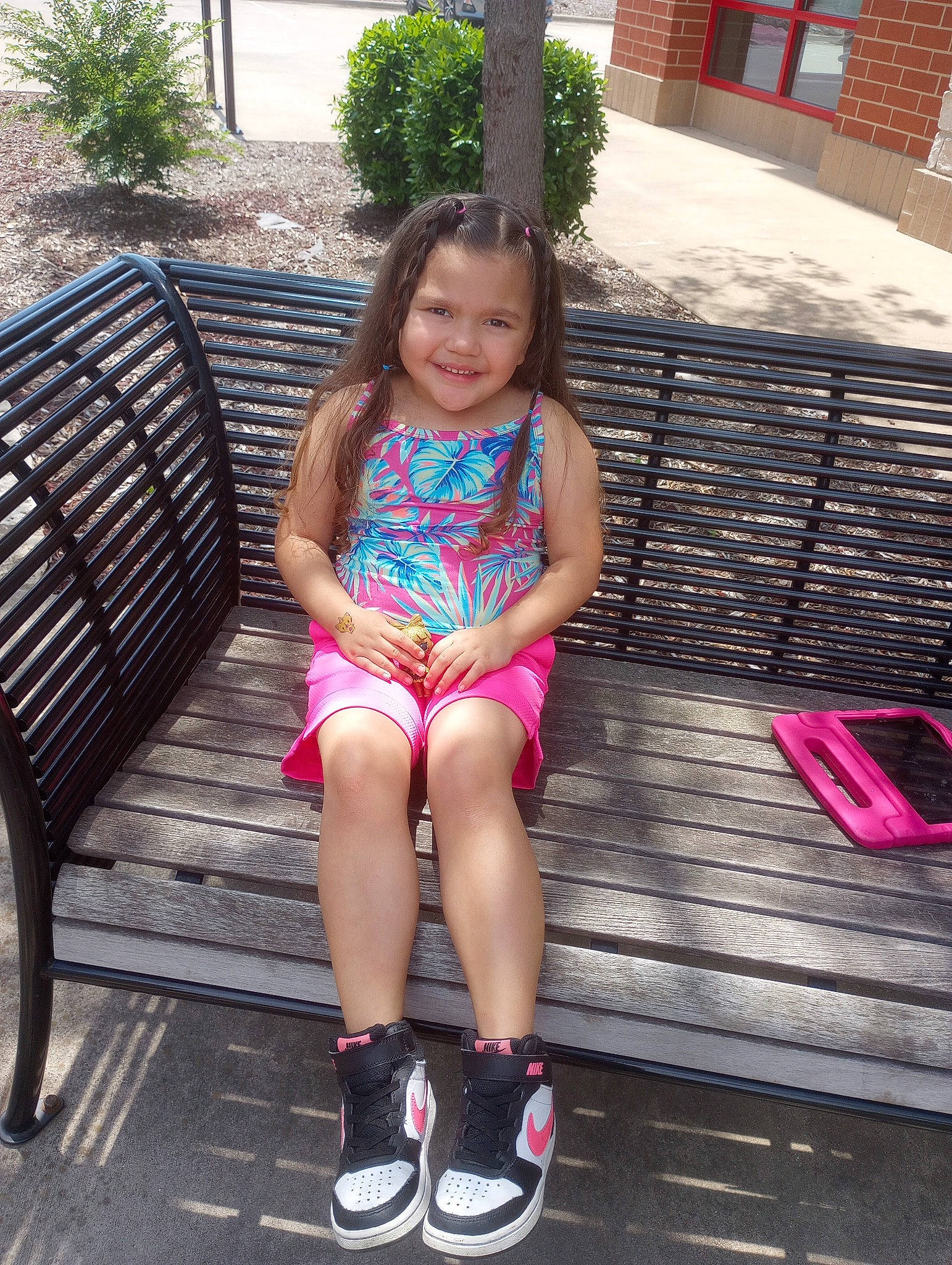 Dallas joined the competition — help win amazing prizes! baby_toddler_clothing, face, fun, grass, hair, happy, head, human_leg, joy, knee, leg, leisure, magenta, outdoor_furniture, person, pink, plant, sitting, smile, thigh