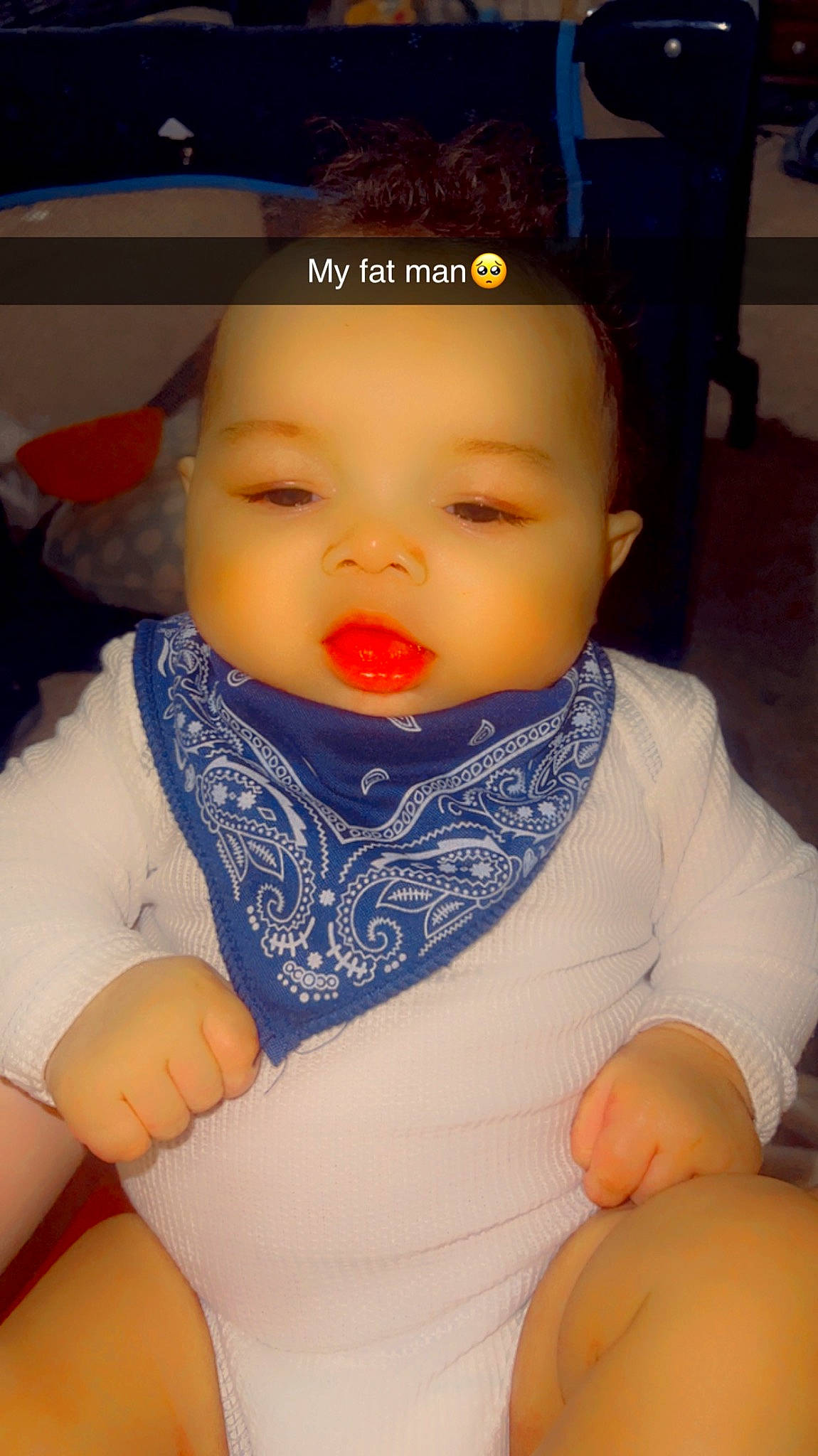 Kaisyn joined the competition — help win amazing prizes! arm, baby, baby_toddler_clothing, bib, blue, chair, cheek, child, fun, hairstyle, happy, iris, mouth, nose, orange, organ, person, skin, sleeve, thigh