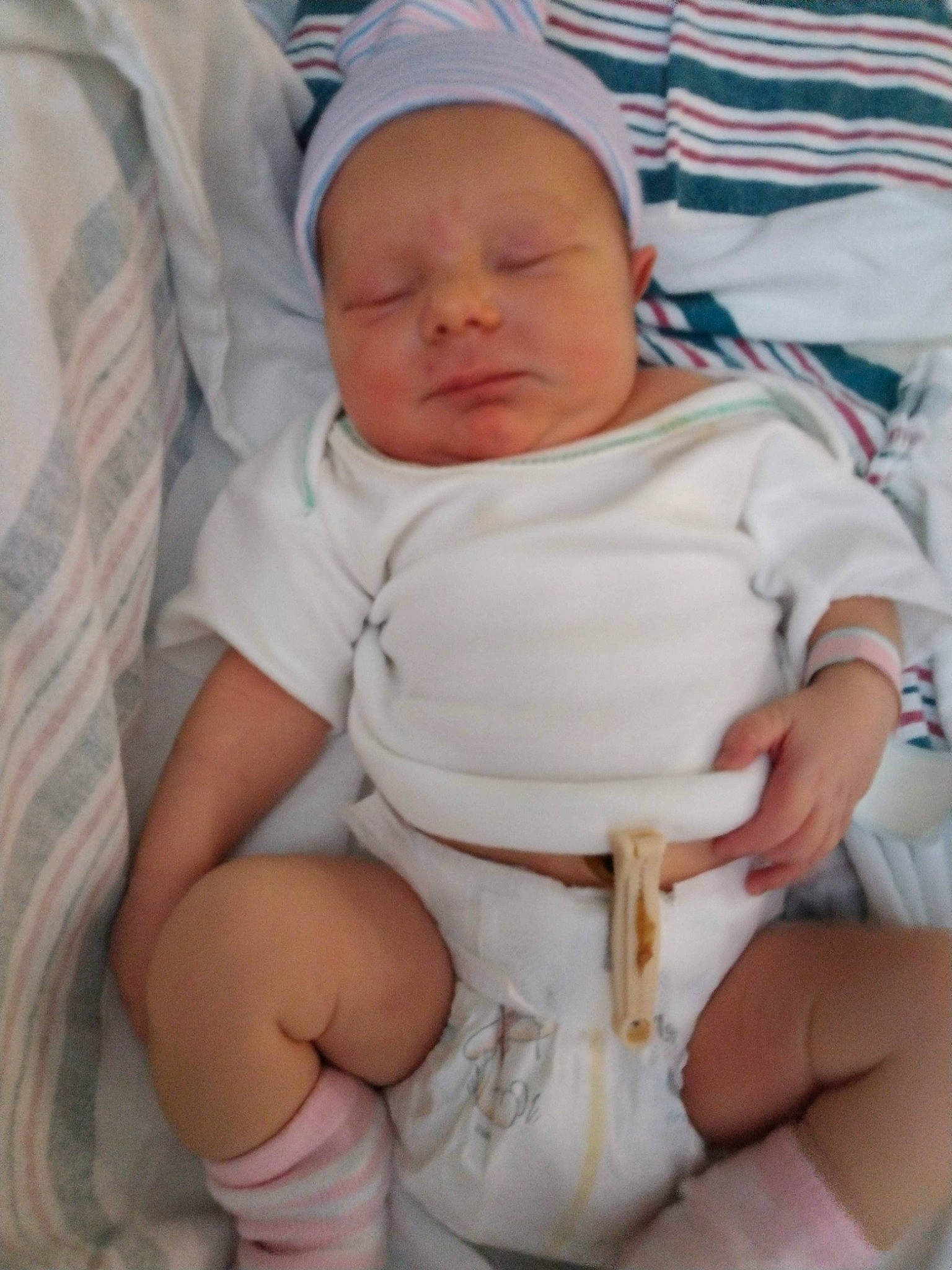 Averie joined the competition — help win amazing prizes! abdomen, baby, baby_products, baby_sleeping, baby_toddler_clothing, cheek, child, comfort, eye, face, finger, foot, hat, head, human_body, linens, person, sitting, skin, thumb