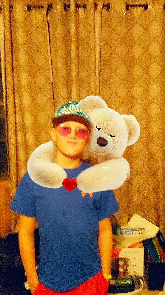 Brennan joined the competition — help win amazing prizes! animation, child, costume, event, eyewear, fun, fur, gesture, goggles, happy, hat, headwear, mascot, person, personal_protective_equipment, plush, recreation, stuffed_toy, sunglasses, t_shirt